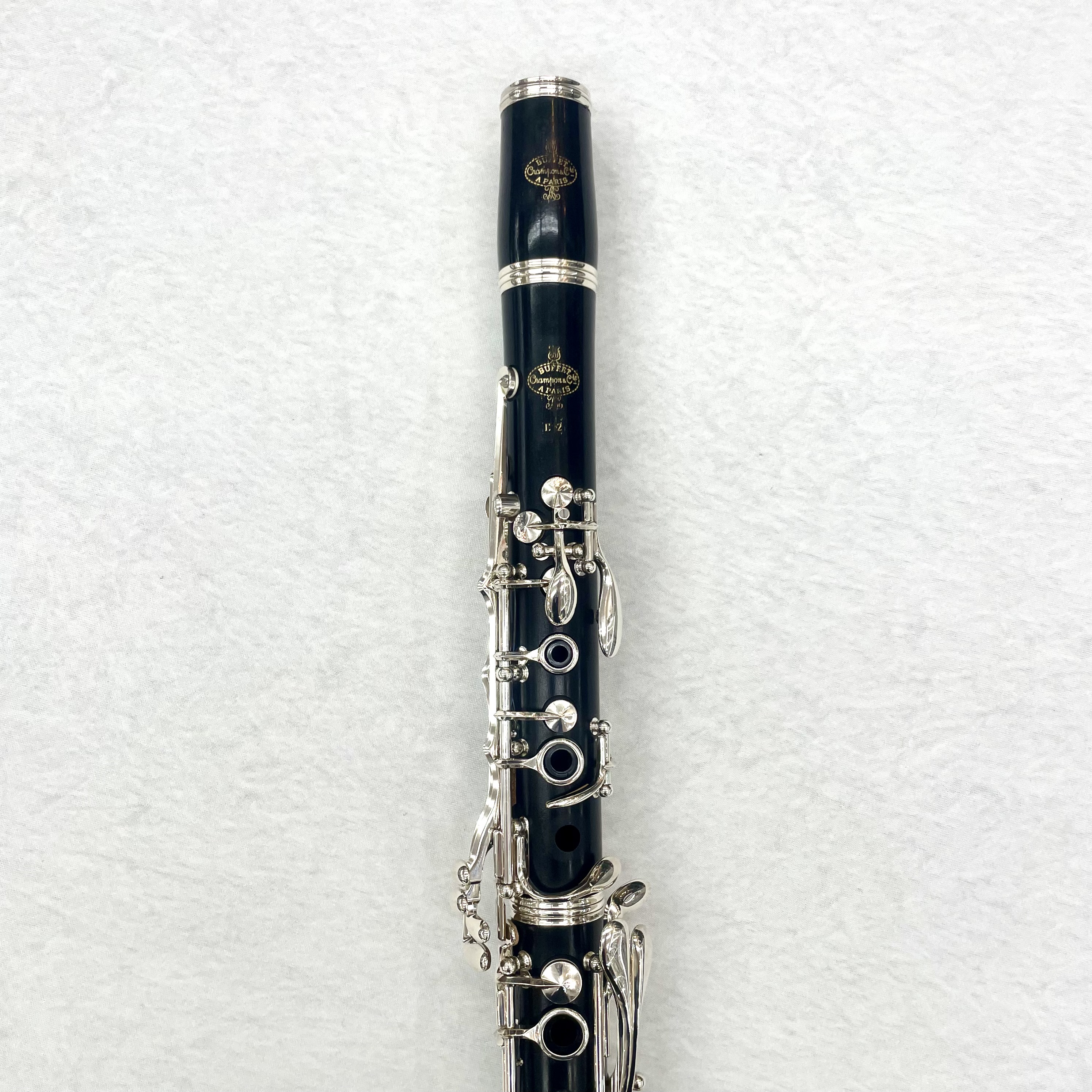 E-12